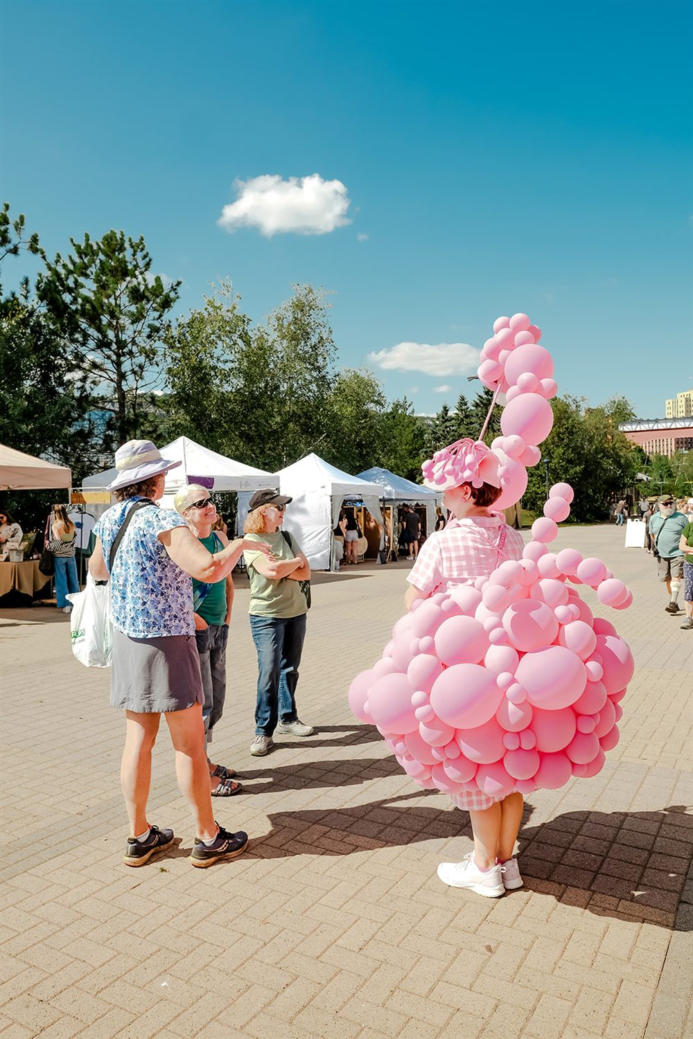 A balloon-bird costume artist at Flock Art Fest on Duluth's Bayfront