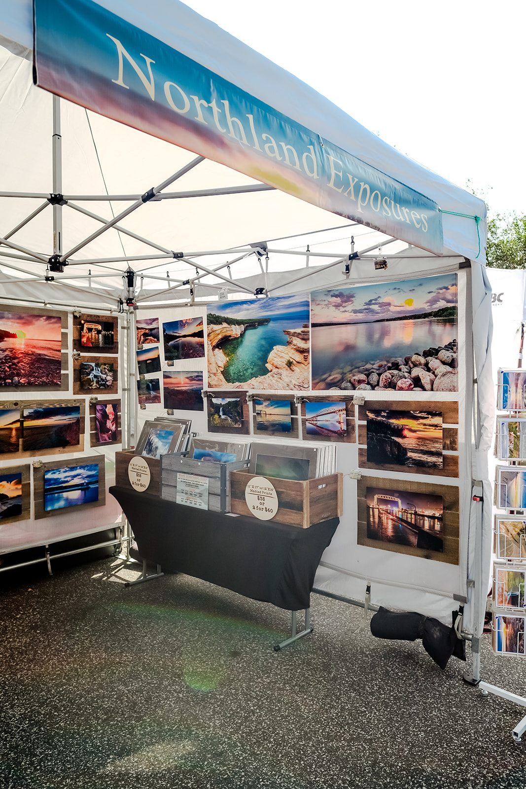 The Northland Exposures photography booth of Lake Superior prints